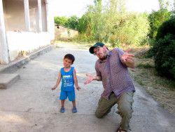A Boy Named Azizbek and I Making Faces in Beshkube Village, Uzbekistan.